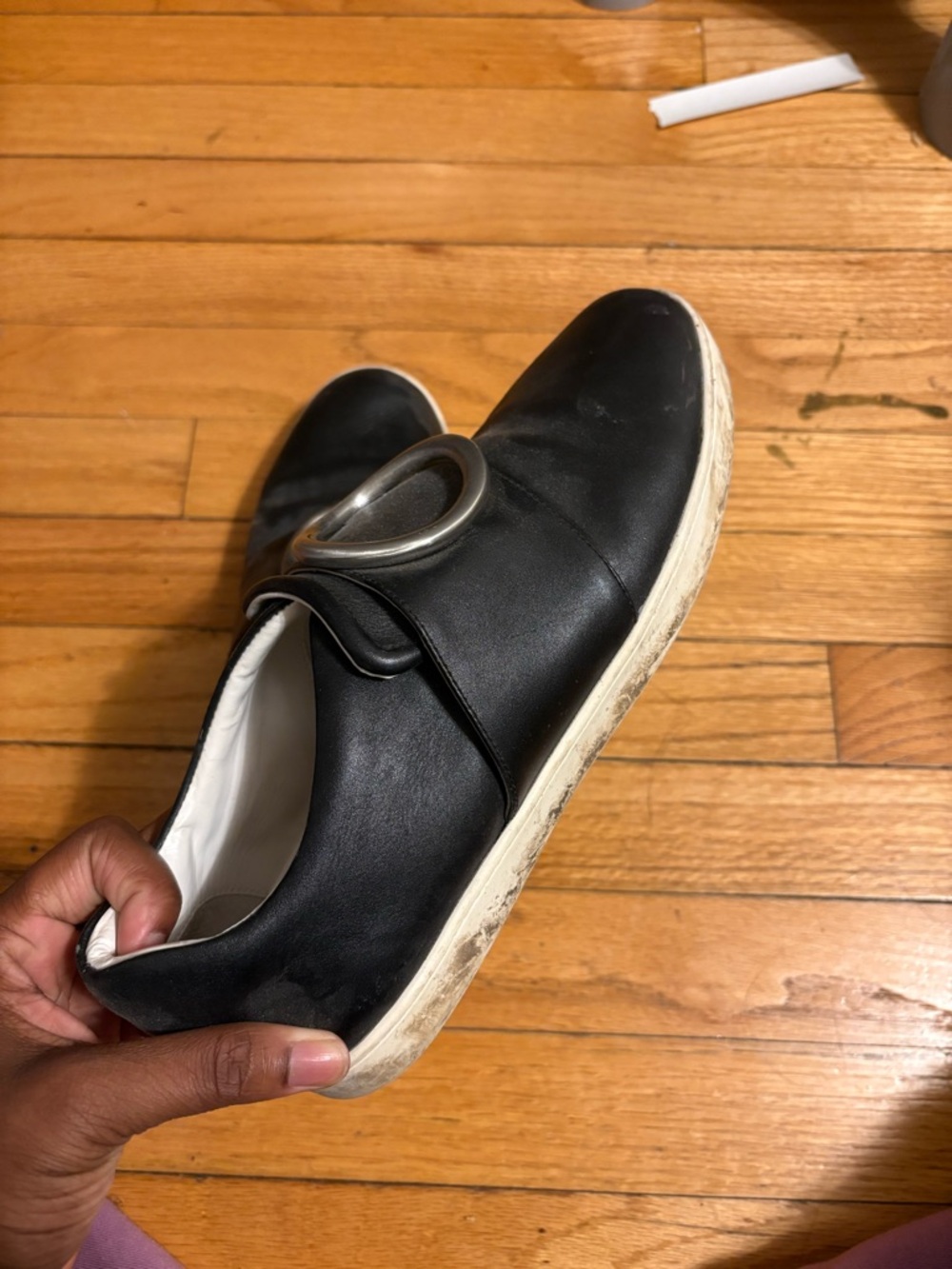 Black Leather Slip-On Sneaker with Silver Buckle